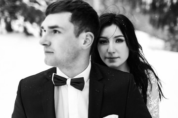 Wedding winter, bride and groom walking at winter wedding day