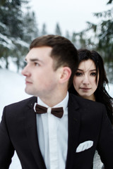 Wedding winter, bride and groom walking at winter wedding day