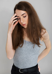 Young woman with headache.