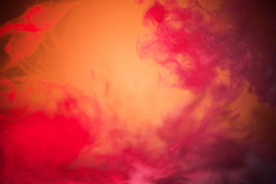 colorful red smoke on yellow background