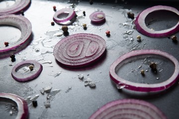 Close-up of onions in tray