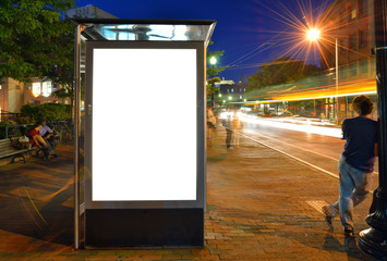 Bus Shelter Billboard and City Lights