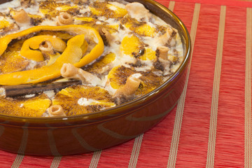 Rice with milk, decorated with orange and chocolate