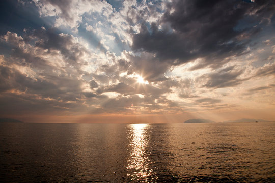 Sea with sun reflected in water, Milazzo, Sicily, Italy, Europe