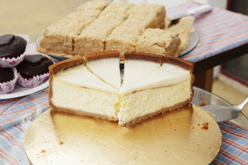 Caramel and chocolate cheesecake on the street food festival.