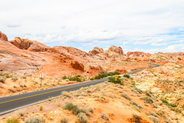 sinuous road crossing valley of fire desert, nevada
