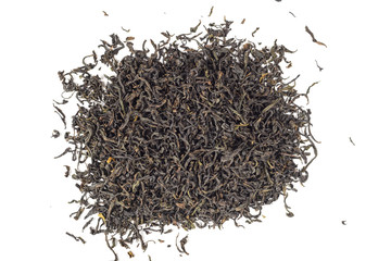 Dry black tea leaves isolated on white