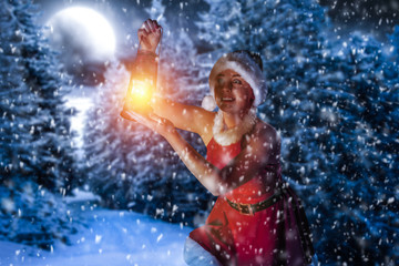 Obraz premium winter woman and lamp 