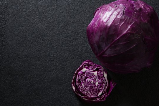 Red cabbage on black background