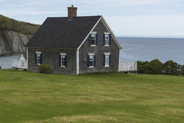 Fototapeta na wymiar House at waterfront, St. Margaret Village, Cape Breton Island, Nova Scotia, Canada