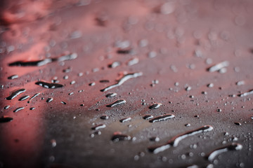 Rain drop on car hood. small depth of field