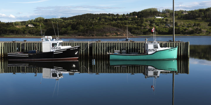 Fototapeta Fishing trawlers moored at dock, Inverness Harbour, Mabou, Cape Breton Island, Nova Scotia, Canada
