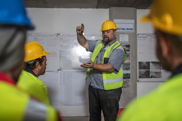 Construction worker demonstrating at training session