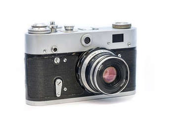 Analog soviet camera FED isolated on white background. Old dusty retro film photographic equipment.