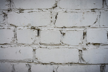 The texture of the wall of bricks painted white
