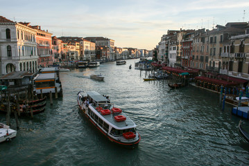 Venice, Italy - June 21, 2010: The people at water transport at Grand Canal. View from Rialto bridge