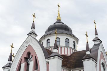 Roof of the Catholic church with crosses