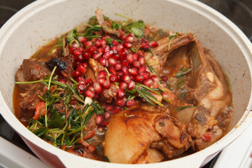Food preparation - lamb fryid with pomegranate and rosemary