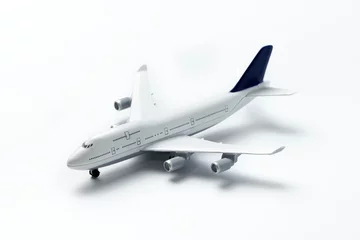 Foto op Plexiglas Miniature airplane isolated © Kenishirotie