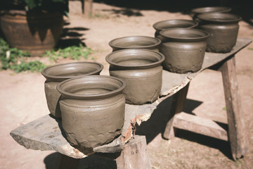 Naklejka premium potter making pots