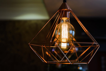 Burning an incandescent lamp with a large decorative spiral