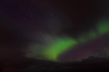 Fototapeta na wymiar Northern Lights Dancing with Stars in Iceland