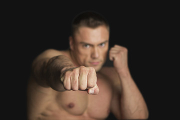 Strong Man Raised Fist on Black