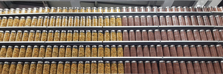 shelves full of jars filled with paste and seed to make a background