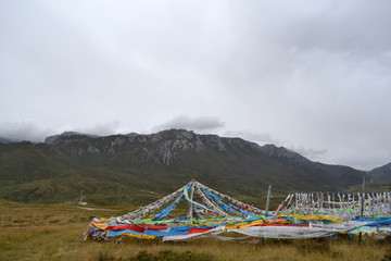 The prayer flags around the mountain behind Serti Gompa Monastery, in Langmusi - Amdo Tibet