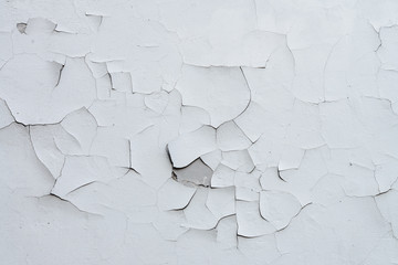 cracked plaster on the wall