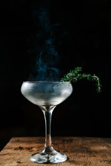 Cocktail preparation with torched thyme