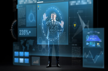 businessman in suit with virtual projection