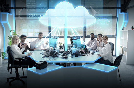 happy business team with cloud computing hologram