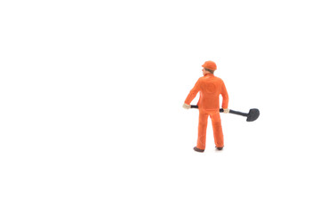 Miniature people engineer worker construction concept isolated on white background