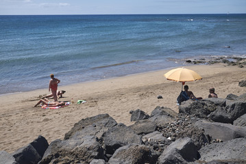 Fototapeta na wymiar Lanzarote, Spain - August 23, 2015 : View of Los Pocillos beach, Lanzarote