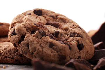 Chocolate cookies on wooden table. Chocolate chip cookies shot.