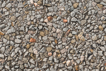 Old asphalt pavement, close-up / Abstract background of old asphalt pavement, close-up 