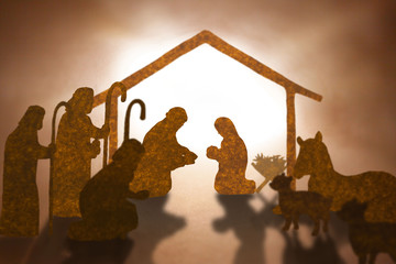 Christmas nativity scene including Jesus,Mary,Joseph,sheep and donkey ,Brown paper cut silhouette...