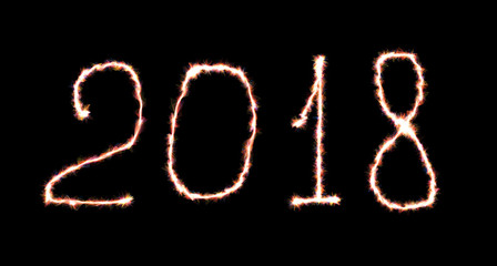 Glowing neon Happy new year 2018 lettering written with fire flame or smoke over black background