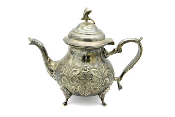 orientalic teapot with eagle on top on white background