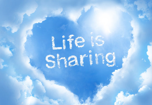 Life is shareing ,cloud word inside heart cloud frame on blue sky background..