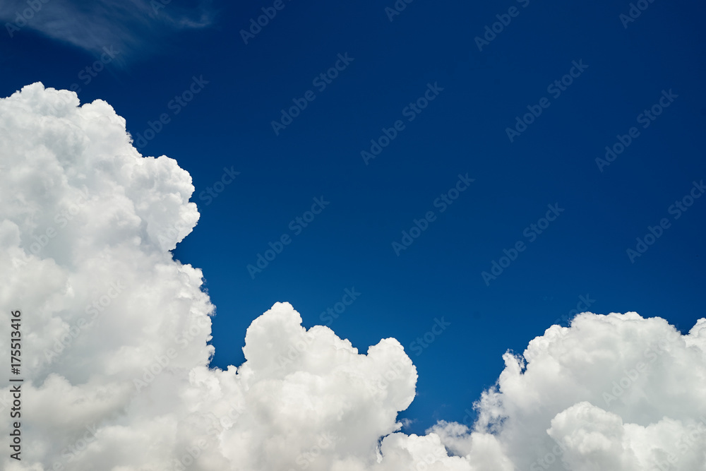 Wall mural white cloudy blue sky for add text above