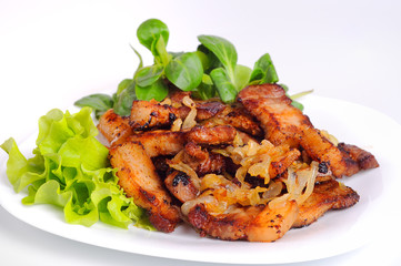 Grilled meat cracklings isolated on white backround