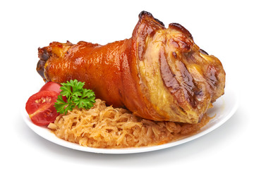 Pork knuckle with fried sauerkraut and vegetables