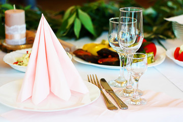 table setting in the restaurant, glasses on the table