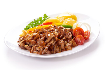 Fried mushrooms Chanterelle in creamy sauce with boiled potatoes