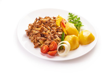 Fried mushrooms Chanterelle in creamy sauce with boiled potatoes