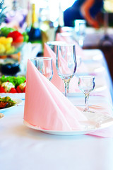 table setting in the restaurant, glasses on the table