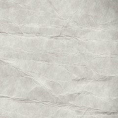Recycled grey creased and stained paper texture background - 175516241