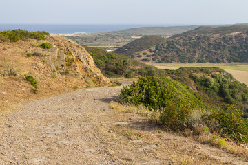 Fototapeta na wymiar Road to Carrapateira with mountain and vegetation